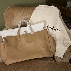 NEW. Quince Italian Leather Triple Compartment Weekender with protective bag.